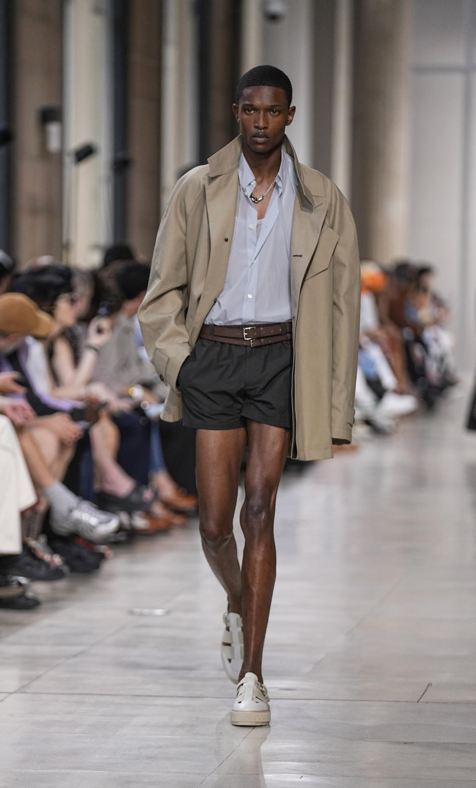 A model wears a creation for the Hermes Menswear Spring/Summer 2024 fashion collection presented in Paris, Saturday, June 24, 2023. (AP Photo/Michel Euler)