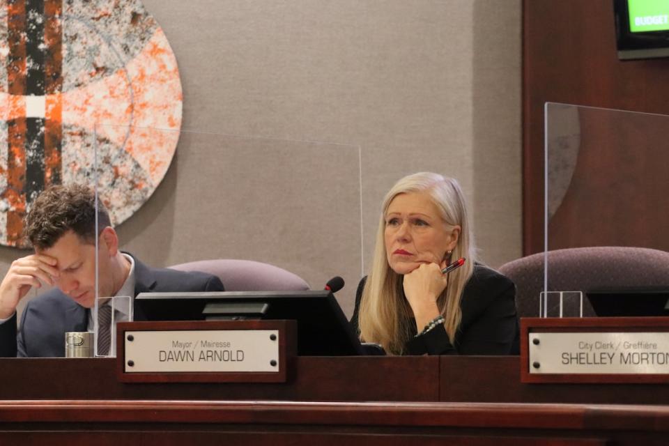 Moncton Mayor Dawn Arnold listens during a city council meeting about the 2024 budget on Nov. 7, 2023.