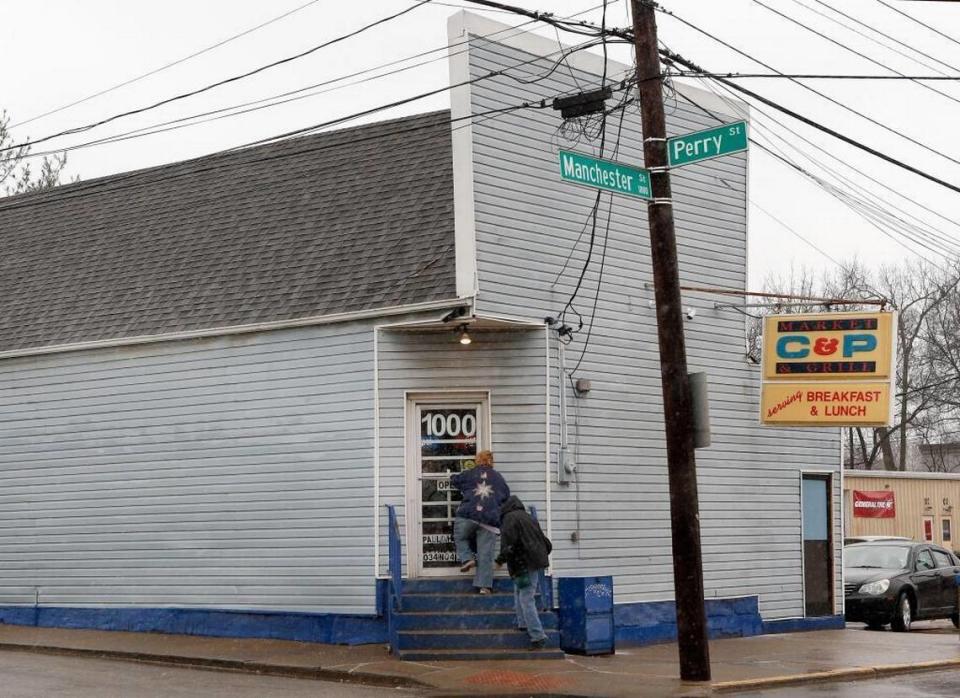 Customers entered the C & P Market and Grill on Manchester Street. It’s open for breakfast and lunch.