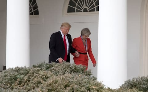 Donald Trump and Theresa May were photographed holding hands in January 2017, raising hopes they could strike up a political friendship - Credit: New York Times / Redux / eyevine