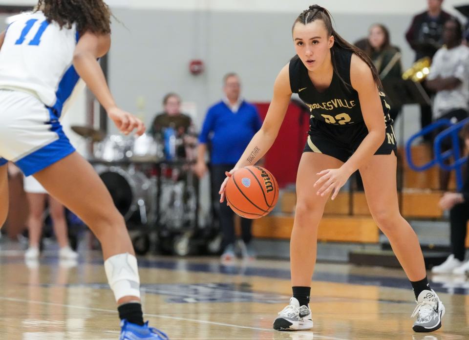 Noblesville Millers guard Reagan Wilson (22) walks up the court Wednesday, Nov. 29, 2023, during the game at Hamilton Southeastern High School in Fishers. The Hamilton Southeastern Royals defeated the Noblesville Millers, 71-69.