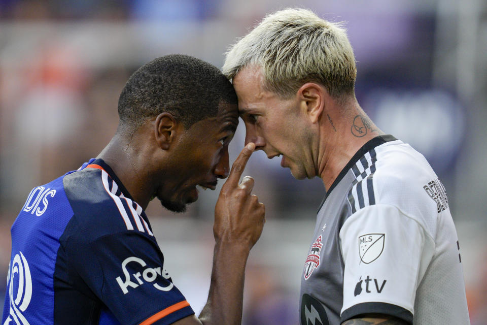 FC Cincinnati's Ray Gaddis, left, confronts Toronto FC's Federico Bernardeschi after being fouled during the first half of an MLS soccer match Wednesday, June 21, 2023, in Cincinnati. (AP Photo/Jeff Dean)