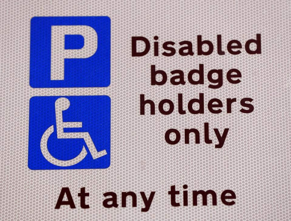 Measures are being introduced to tackle issues faced by disabled motorists applying for blue badge permits (Jonathan Brady/PA) (PA Archive)