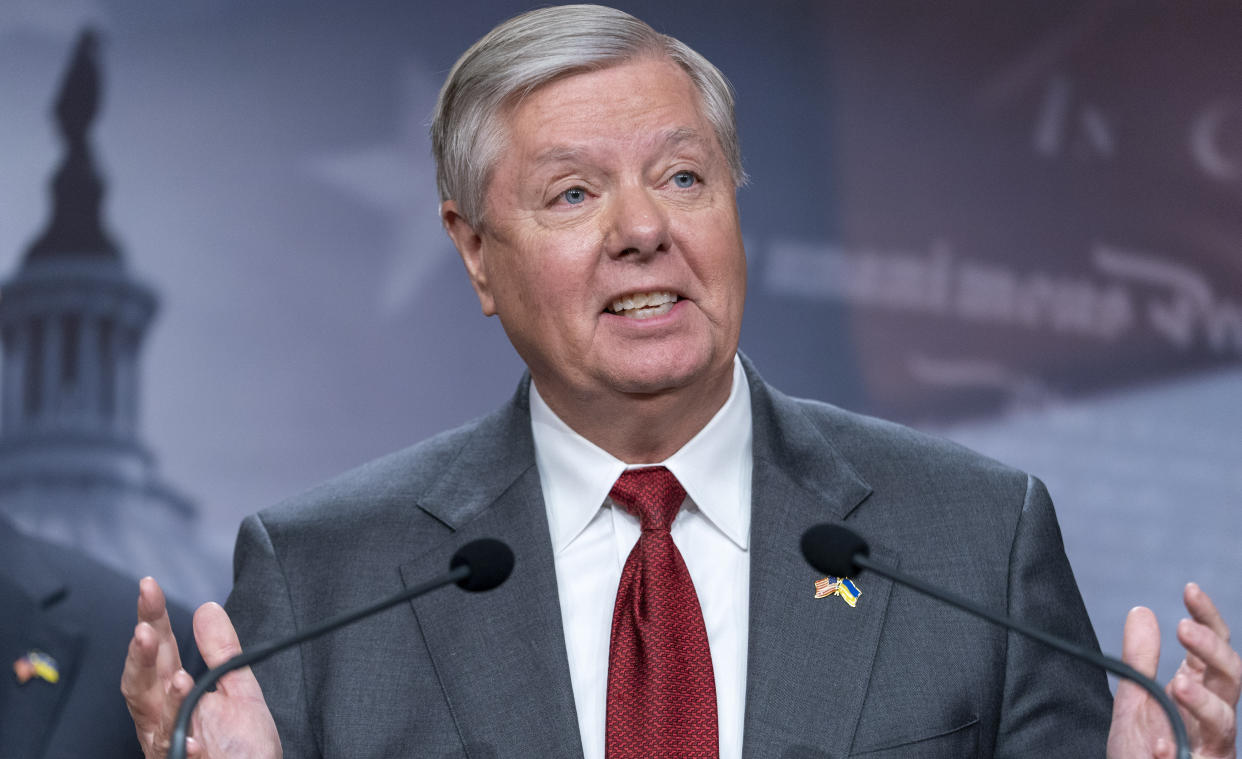 Sen. Lindsey Graham at the microphone.