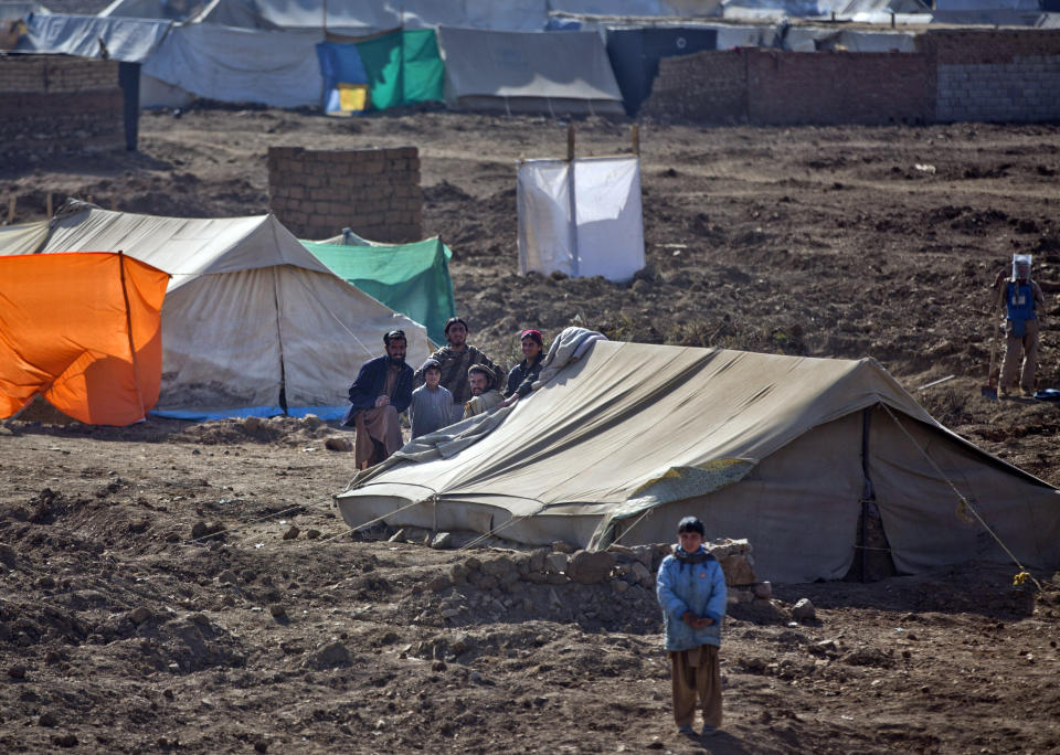 FILE- Pakistani refugees at Gulan camp, some 20 kilometers (12 miles) from the border in the restive Khost province, Afghanistan on Jan. 19, 2015. Pakistan fired off a sharp warning Sunday, April 17, 2022, to Afghanistan's new hardline religious rulers to stop sheltering homegrown Pakistani Taliban militants, who have been staging increasingly deadly attacks against the country's military. The warning followed Afghan reports that Pakistani aircraft late Friday carried out bombing raids in Afghanistan’s eastern Khost and Kunar provinces, killing civilians. (AP Photo/Massoud Hossaini, File)