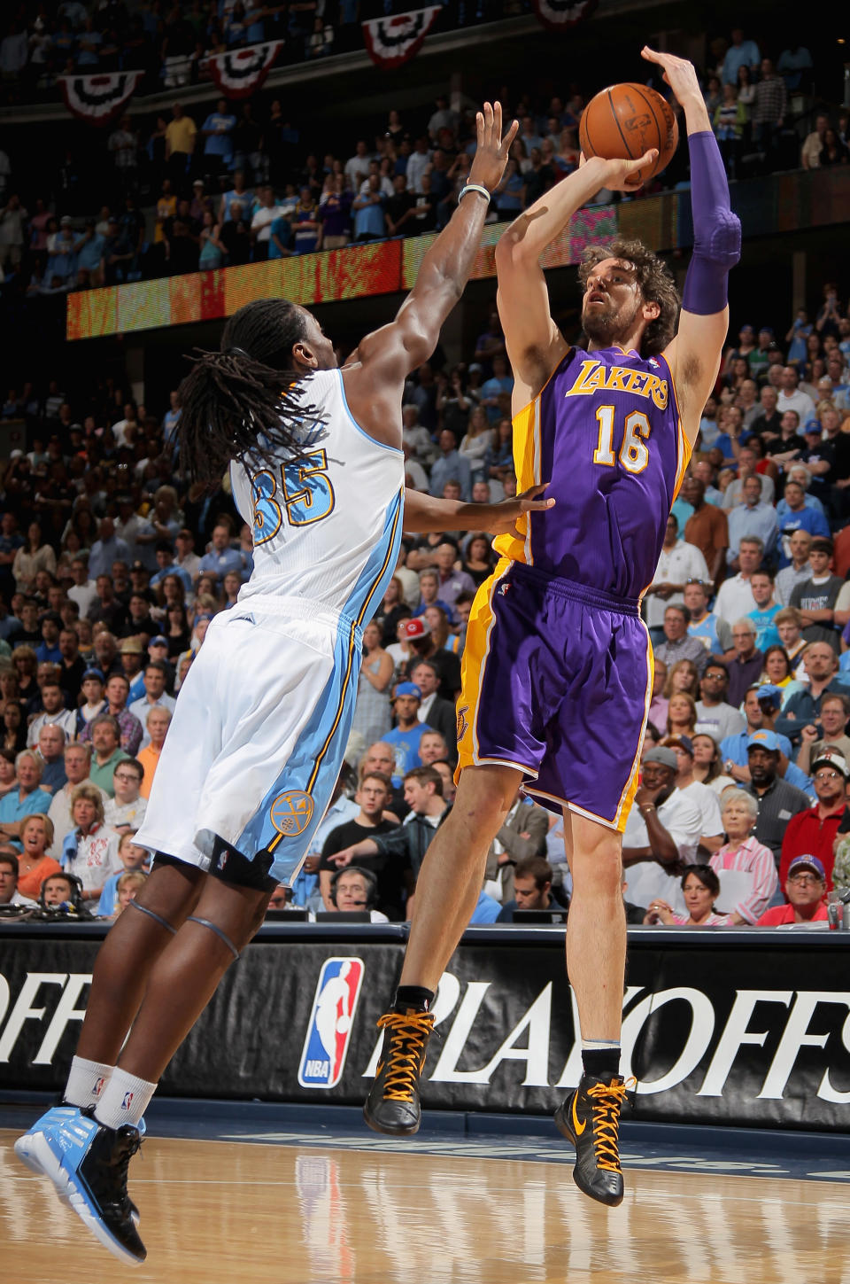 DENVER, CO - MAY 04: Pau Gasol #16 of the Los Angeles Lakers takes a shot over Kenneth Faried #35 of the Denver Nuggets in Game Three of the Western Conference Quarterfinals in the 2012 NBA Playoffs at Pepsi Center on May 4, 2012 in Denver, Colorado. NOTE TO USER: User expressly acknowledges and agrees that, by downloading and or using this photograph, User is consenting to the terms and conditions of the Getty Images License Agreement. (Photo by Doug Pensinger/Getty Images)