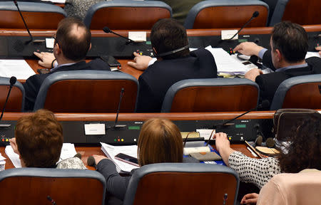 Deputies of the Macedonian parliament vote to pass constitutional changes to allow the Balkan country to change its name to the Republic of North Macedonia, in Skopje, Macedonia, January 11, 2019.REUTERS/ Tomislav Georgiev