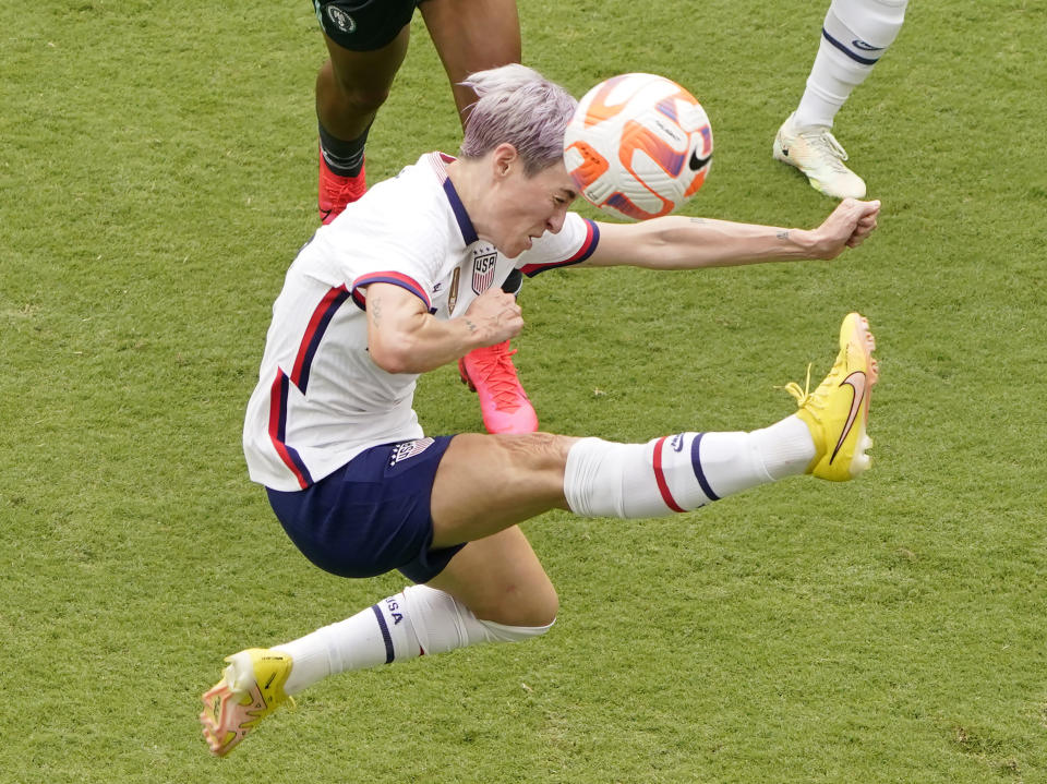 KANSAS CITY, KS - SEPTEMBER 03:  Megan Rapinoe #15 of United States heads the ball towards the goal during the second half of an international friendly match against Nigeria at Children's Mercy Park on September 3, 2022 in Kansas City, Kansas. (Photo by Ed Zurga/Getty Images)