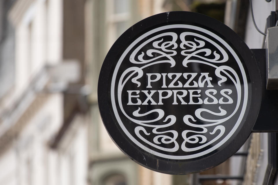 CARDIFF, WALES - JULY 27: A close-up of a Pizza Express restaurant sign on July 27, 2020 in Cardiff, Wales. Many UK businesses are announcing job losses due to the effects of the coronavirus pandemic and lockdown. (Photo by Matthew Horwood/Getty Images)