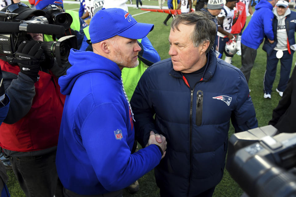 FILE - Buffalo Bills head coach Sean McDermott, left, talks to New England Patriots head coach Bill Belichick after an NFL football game, Sunday, Dec. 3, 2017, in Orchard Park, N.Y. The Patriots won 23-3. Bill Belichick and the New England Patriots dominated the Buffalo Bills from 2000 to 2019, it was difficult to dub it a rivalry. The tables finally seem to be turning in the AFC East, with Buffalo having won three of four and consecutive division titles, in preparing to host New England in a wild-card playoff on Saturday night. (AP Photo/Rich Barnes, File)