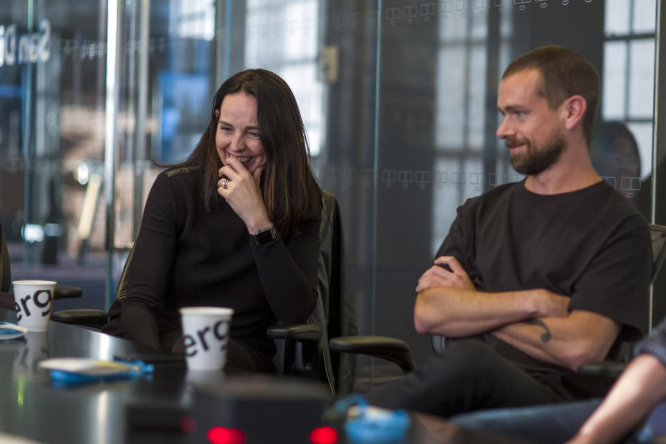 Sarah Friar, chief financial officer of Square Inc., left, laughs as Jack Dorsey, co-founder and chief executive officer of Twitter Inc., listens during an interview in San Francisco, California, U.S., on Thursday, March 2, 2017. Electronic-payment company, Square Inc., run by Dorsey, is offering a range of new services, including loans and software that lets customers manage inventory and analyze sales. Photographer: David Paul Morris/Bloomberg via Getty Images