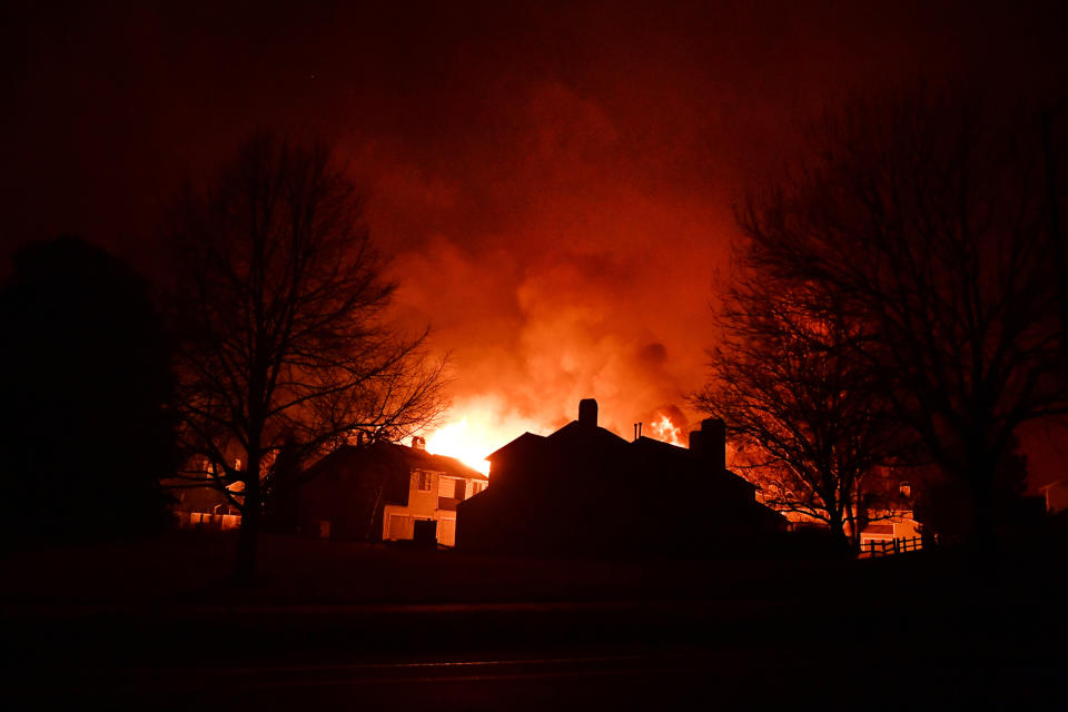 Shocking red skies above homes in Boulder County. (Denver Post via Getty Images)