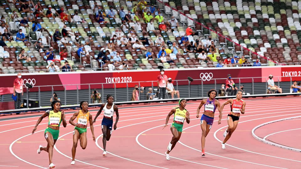 Fraser-Pryce (center) competes in the 200-meter final at the Tokyo Olympics in 2021. - Charly Triballeau/AFP/Getty Images