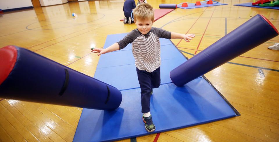 Thomas Stands, 4, knocks down the pillars like The Incredible Hulk on Nov. 17 during the Superhero Training Academy portion of the Superhero Spectacular program at the Worthington Community Center. The Parks & Recreation Department is asking residents to take a survey to help shape future programming.