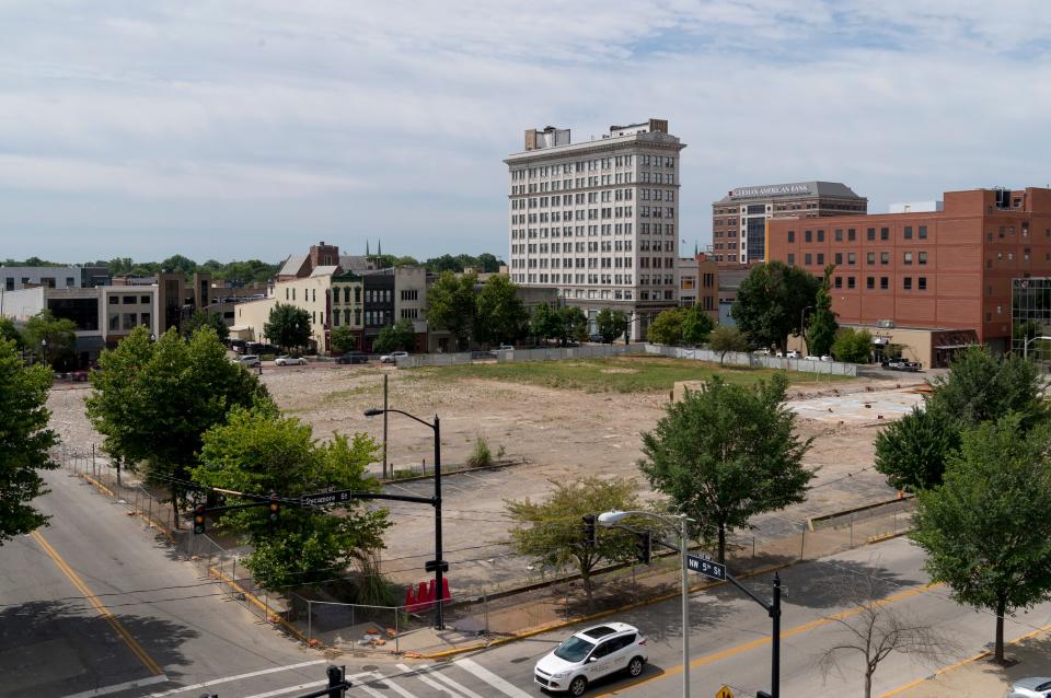 The lot where the 18-story 420 Main Street tower was imploded and the Sycamore building was removed sits empty in Downtown Evansville, Ind., Tuesday morning,  June 28, 2022.