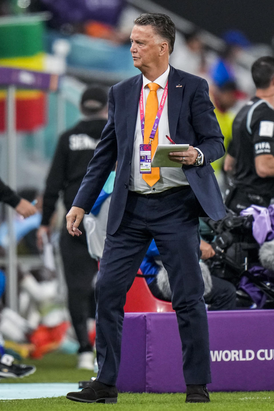 Head coach Louis van Gaal of the Netherlands gives instruction inside the box team area during the World Cup, group A soccer match between Senegal and Netherlands at the Al Thumama Stadium in Doha, Qatar, Monday, Nov. 21, 2022. (AP Photo/Luca Bruno)