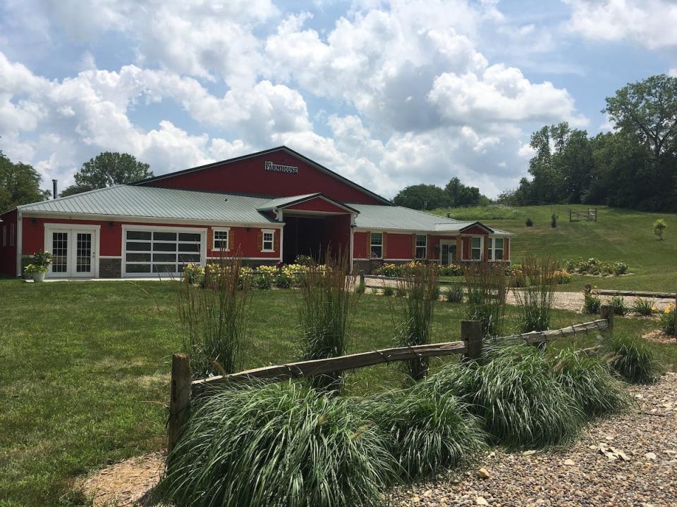 an Airbnb listing called The Farmhouse & Optional Event Venue in Norwalk, Iowa