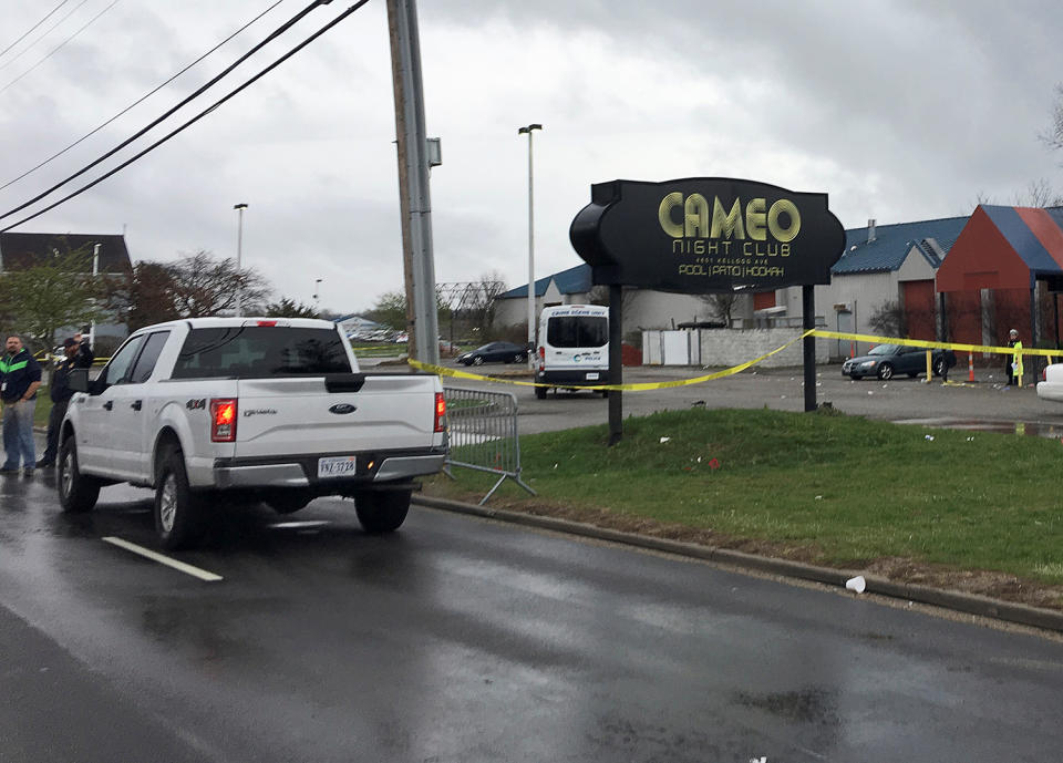 Police tape blocks access to the crime scene after a mass shooting at the Cameo Nightlife club in Cincinnati