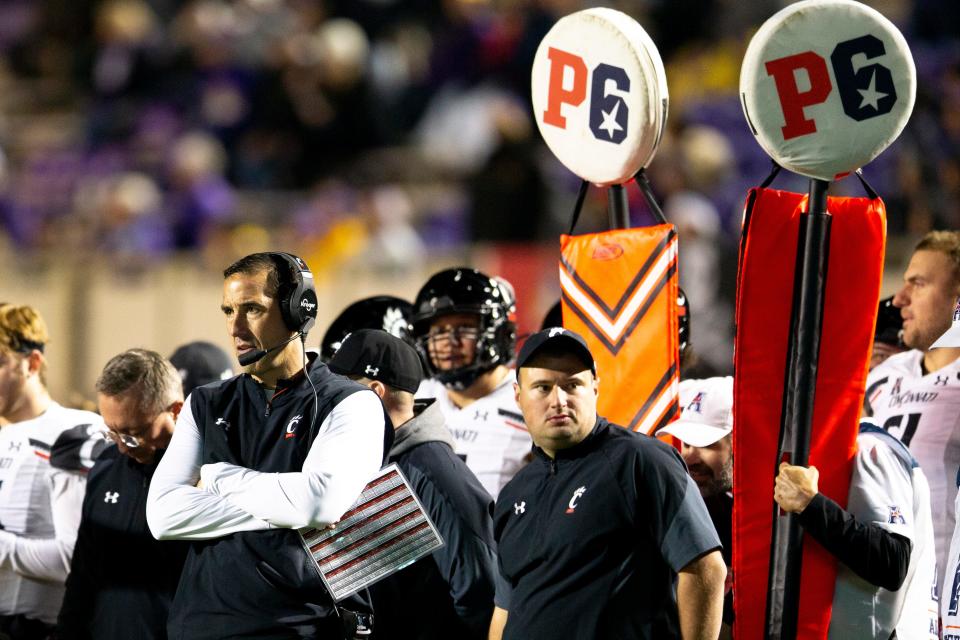 Cincinnati Bearcats head coach Luke Fickell looks on in the second half of the NCAA football game at Dowdy-Ficklen Stadium in Greenville, NC, on Friday, Nov. 26, 2021. Cincinnati Bearcats defeated East Carolina Pirates 35-13. 