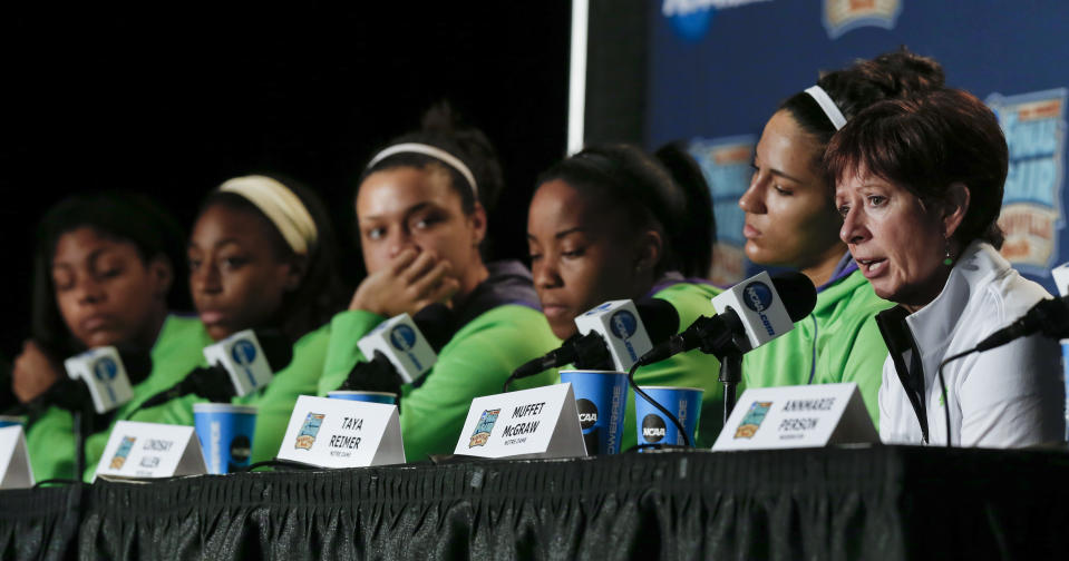 Notre Dame head coach Muffet McGraw, right, answers questions during a news conference at the NCAA women's Final Four college basketball tournament Monday, April 7, 2014, in Nashville, Tenn. Notre Dame is scheduled to face Connecticut in the championship game Tuesday. (AP Photo/John Bazemore)