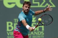 Mar 25, 2017; Miami, FL, USA; Stan Wawrinka of Switzerland hits a backhand against Horacio Zeballos of Argentina (not pictured) on day five of the 2017 Miami Open at Crandon Park Tennis Center. Wawrinka won 6-3, 6-4. Mandatory Credit: Geoff Burke-USA TODAY Sports