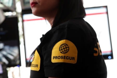 An employee of Prosegur works in the