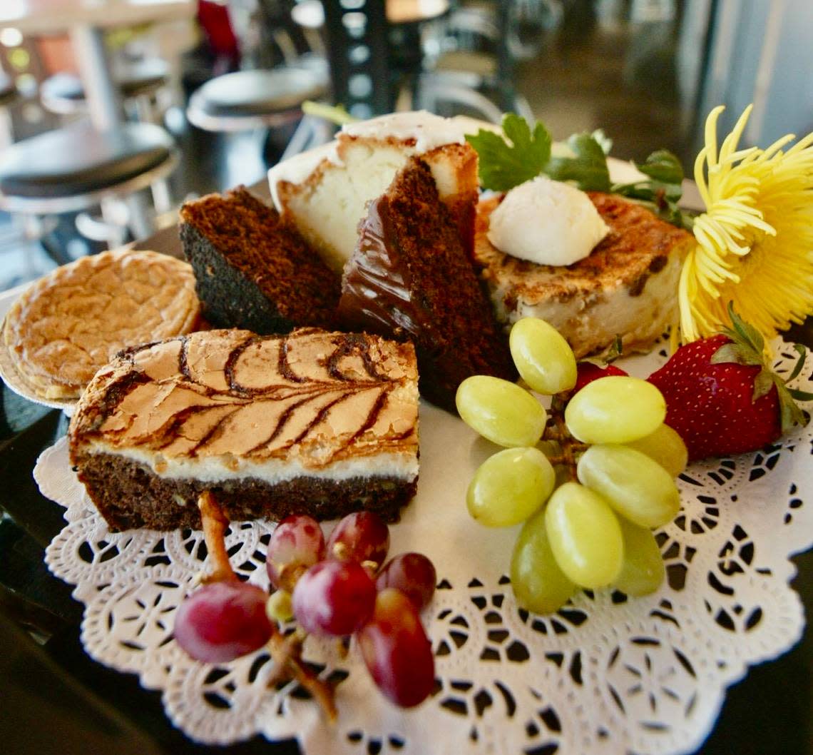 Dessert choices at Tastebuds Eatery April 28, 2005, clockwise from top: 7Up cake, bread pudding, cheesecake brownie, sweet potato pie and cocoa cake.