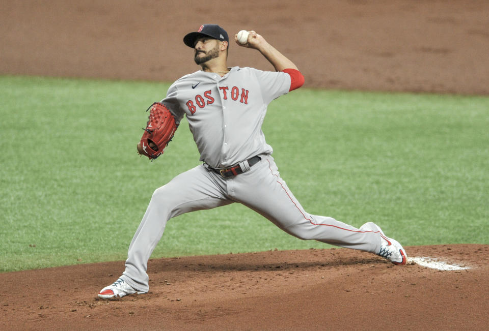 Boston Red Sox starter Martin Perez pitches against the Tampa Bay Rays during the first inning of a baseball game Wednesday, Aug. 5, 2020, in St. Petersburg, Fla. (AP Photo/Steve Nesius)