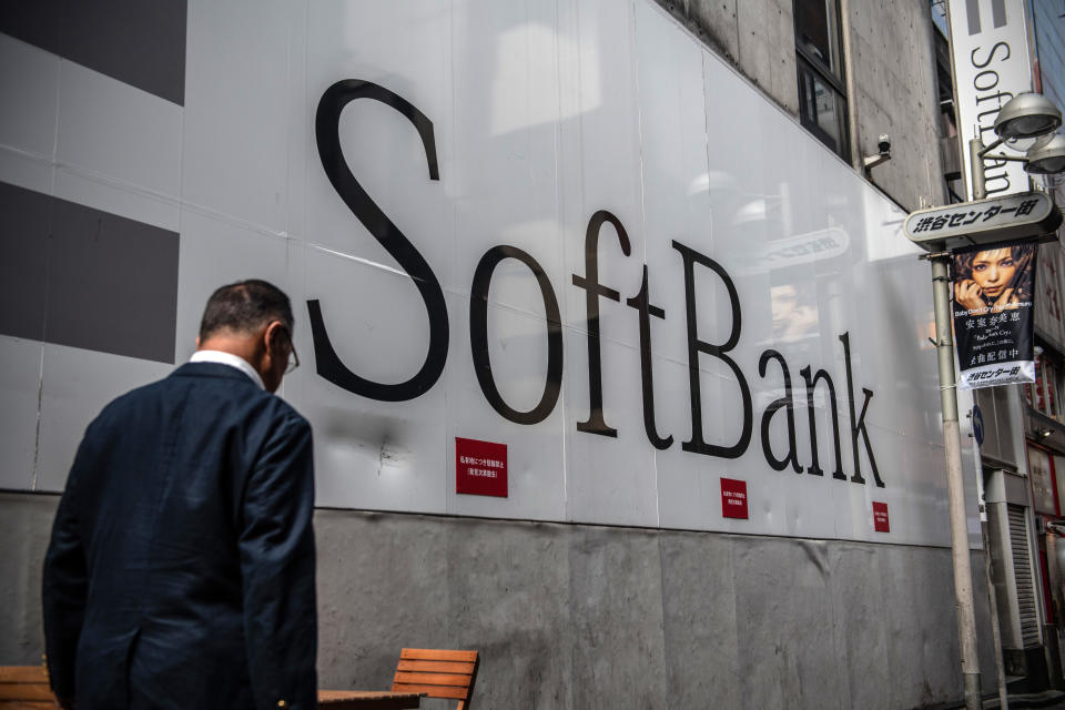 TOKYO, JAPAN - SEPTEMBER 30: A man walks past a SoftBank mobile phone store on September 30, 2019 in Tokyo, Japan. SoftBank, the technology and investment conglomerate owned by Masayoshi Son, is one of the largest investors in troubled American real estate company WeWork. (Photo by Carl Court/Getty Images)