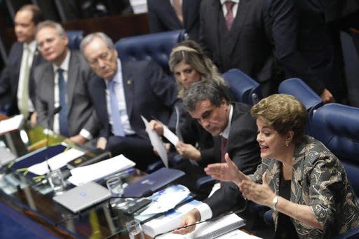 Brazil's suspended President Dilma Rousseff speaks at her own impeachment trial, in Brasilia, Brazil, Monday, Aug. 29, 2016. Fighting to save her job, Rousseff told senators on Monday that the allegations against her have no merit.