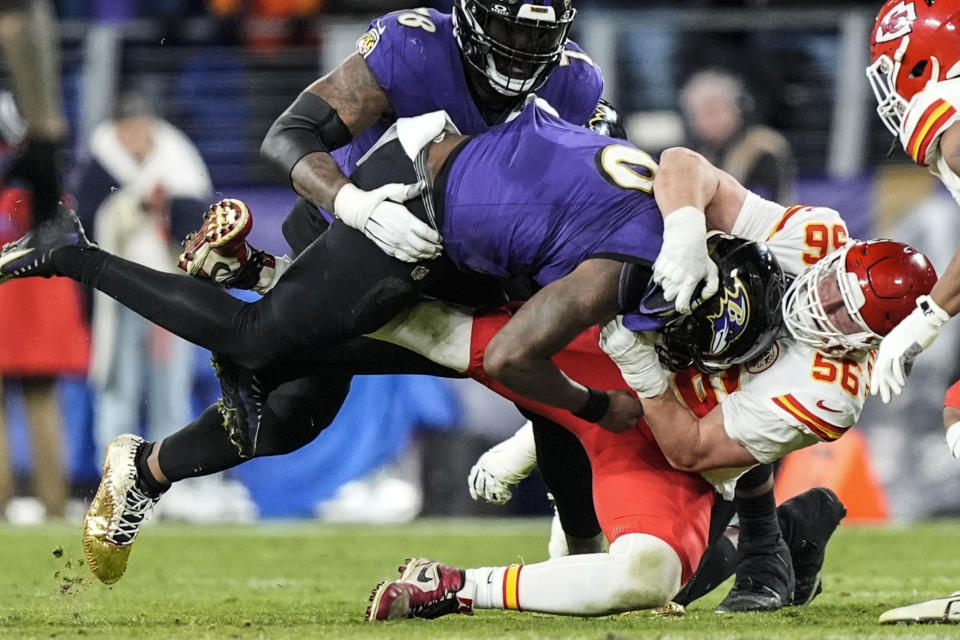 Kansas City Chiefs defensive end George Karlaftis (56) sacks Baltimore Ravens quarterback Lamar Jackson (8) during the second half of an AFC Championship NFL football game, Sunday, Jan. 28, 2024, in Baltimore. (AP Photo/Alex Brandon)