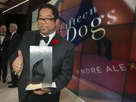 FILE PHOTO: Alexis, author of "Fifteen Dogs", poses with the Scotiabank Giller Prize at a gala event in Toronto