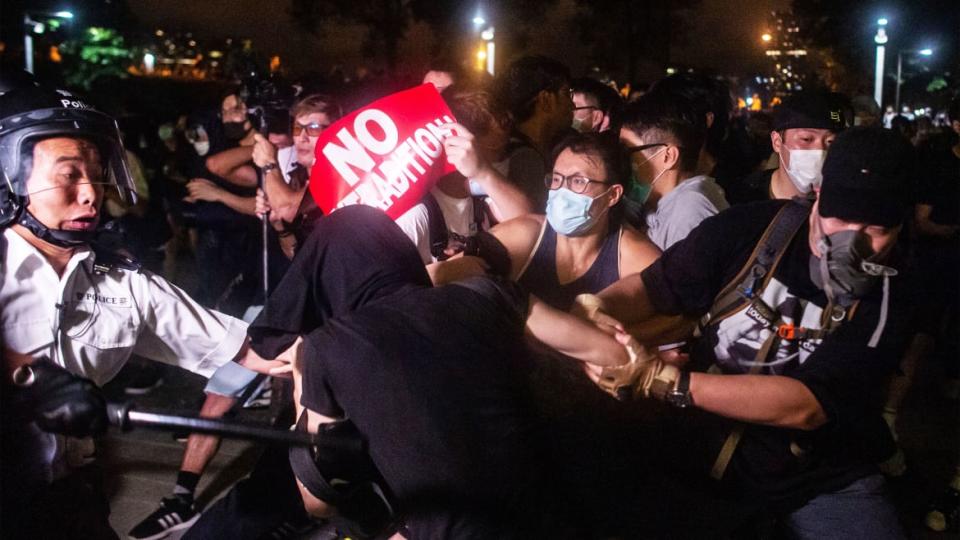 <div class="inline-image__title">1148743614</div> <div class="inline-image__caption"><p>A paper of 'No Extradition' is held by protesters during the clashes with the police at Legislative Council in Hong Kong after a rally against a controversial extradition law proposal in Hong Kong on early June 10, 2019.</p></div> <div class="inline-image__credit">PHILIP FONG / AFP</div>