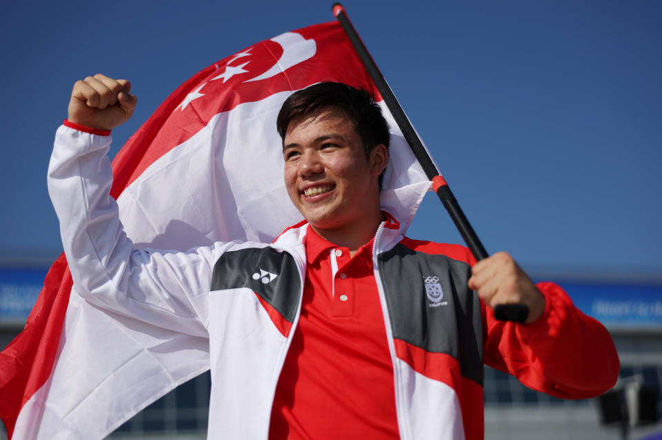 Singapore kitefoiler Maximilian Maeder celebrates winning gold after a dominant showing in the Formula Kite competition. (PHOTO: Sport Singapore/Jeremy Lee)
