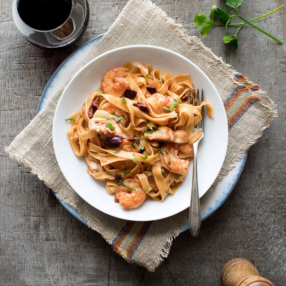 <p>Because refrigerated fresh pasta cooks much faster than dried pasta, this Italian pasta dish will be on the table lickety-split! Puttanesca, traditionally made with tomatoes, olives, capers, anchovies and garlic, gets a makeover with shrimp for extra protein and artichoke hearts to boost the vegetable servings (and the fiber!). If you can't find frozen artichoke hearts, sub in drained canned artichoke hearts. <a href="https://www.eatingwell.com/recipe/267851/quick-shrimp-puttanesca/" rel="nofollow noopener" target="_blank" data-ylk="slk:View Recipe;elm:context_link;itc:0;sec:content-canvas" class="link ">View Recipe</a></p>