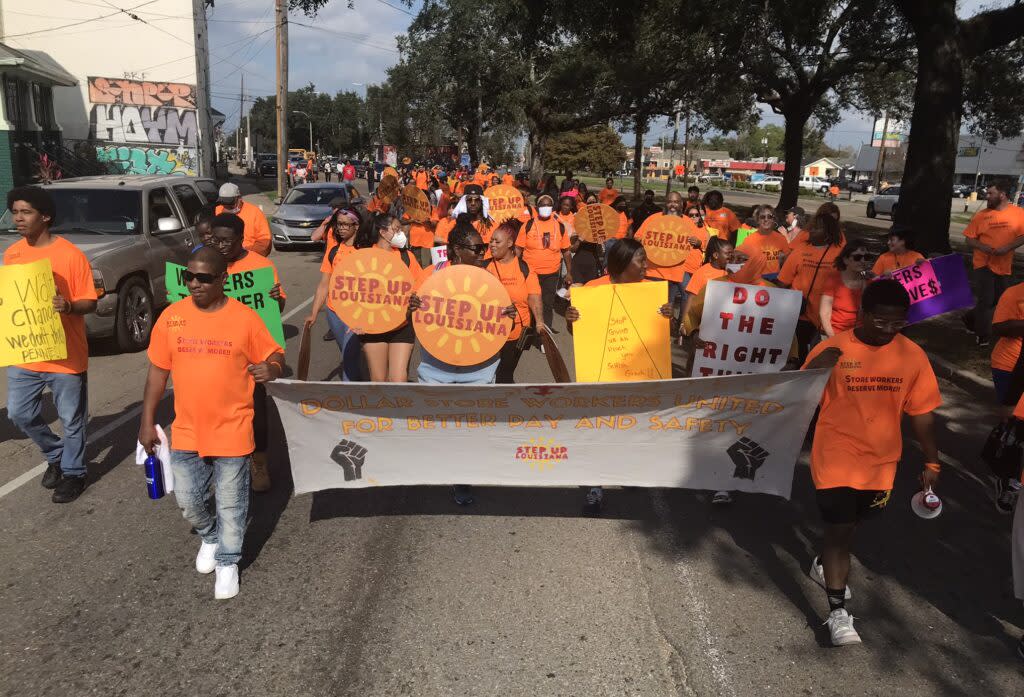 Dollar store employees march in protest in New Orleans, seeking safer working conditions and better pay. (Greg LaRose/Louisiana Illuminator)