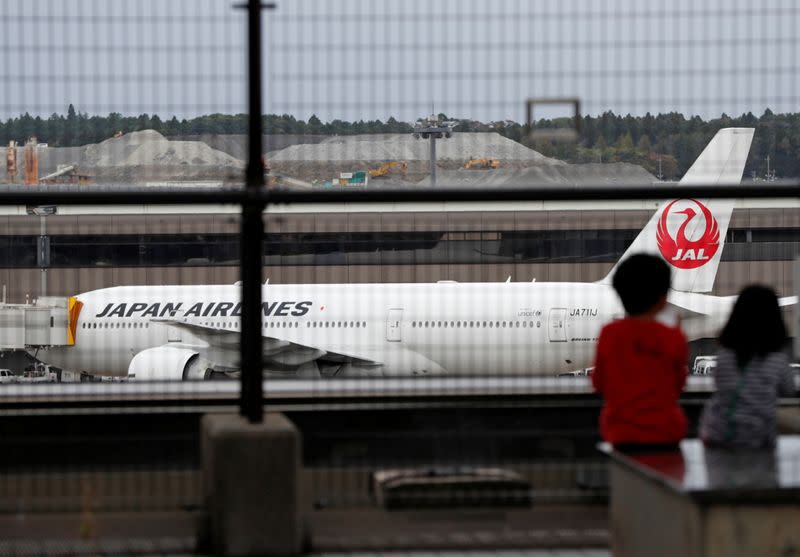 A JAL airplane is seen at Narita international airport in the east of Tokyo