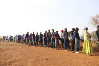 Zimbabweans queue to cast their votes at a polling station in Kwekwe, Zimbabwe, Wednesday, Aug. 23, 2023. Polls have opened in Zimbabwe as President Emmerson Mnangagwa seeks a second and final term in a country with a history of violent and disputed votes. (AP Photo)