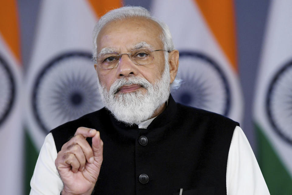 This handout photograph released by India's Press Information Bureau shows Indian Prime Minister Narendra Modi addresses the Davos Agenda 2022, via virtual meeting, in New Delhi, India, Monday, Jan. 17, 2022. The Davos Agenda, which takes place from Jan. 17 to Jan. 21, 2022, is an online edition of the annual Davos meeting of the World Economy Forum due to the coronavirus pandemic. (Press Information Bureau via AP)