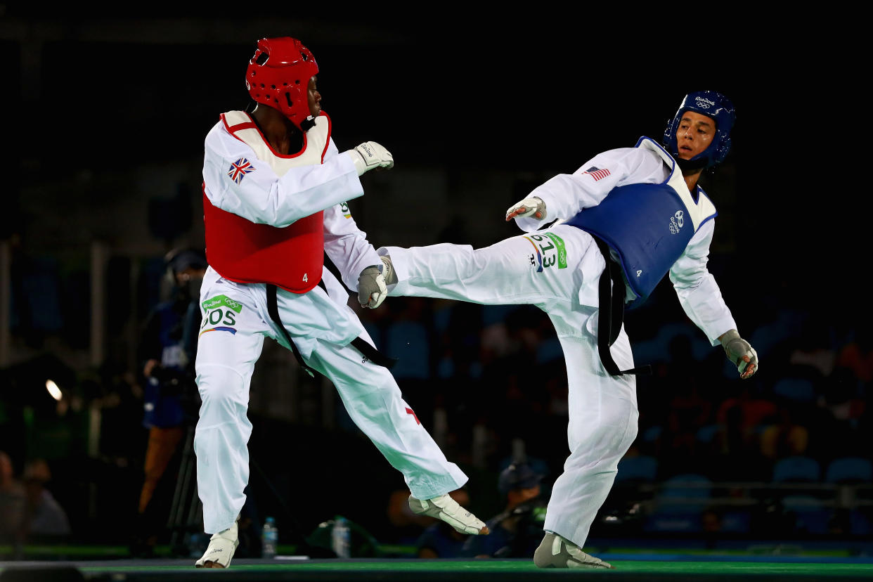 The U.S. Olympic Committee and USA Taekwondo have been named in a lawsuit by four former female athletes claiming Steven Lopez, right, and his brother and team coach, Jean, sexually abused them and both organizations ignored it. (Getty Images)