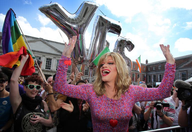 Drag queen and gay rights activist Rory O'Neill, also known as "Panti", celebrates with gay marriage supporters at Dublin Castle on May 23, 2015