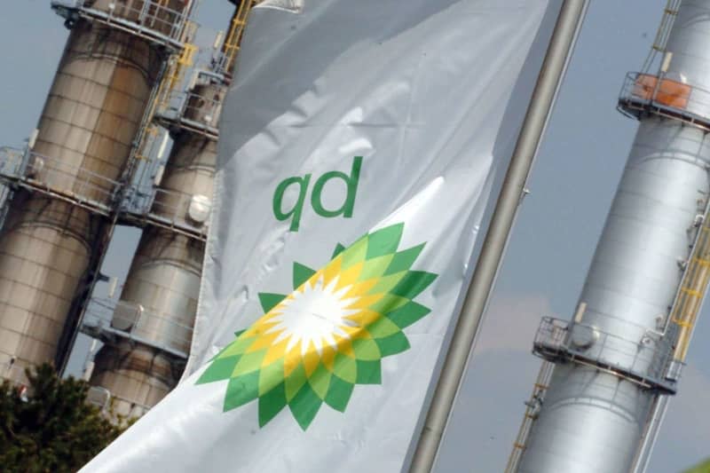 A flag bearing the British Petrolium logo flaps in the wind in front of the BP refinery in Cologne. Achim Scheidemann/dpa