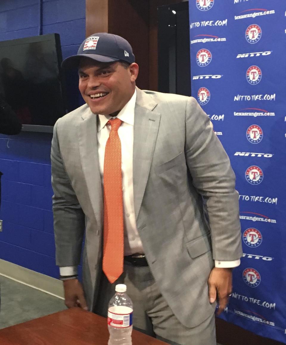 Former Texas Rangers catcher Ivan Rodriguez smiles during a gathering with reporters Wednesday, Jan. 18, 2017, in Arlington, Texas. Rodriguez was elected to baseball's Hall of Fame on Wednesday. Rodriguez is just the second catcher elected on the first ballot; Johnny Bench is the other. (AP Photo/Schuyler Dixon)
