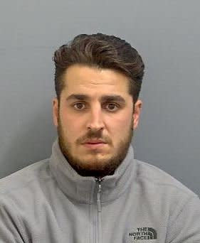 Maurice Rogers has been jailed for three years eight months after he removed his balaclava during a smash and grab raid on a shop to steal a cash machine in Bedford.