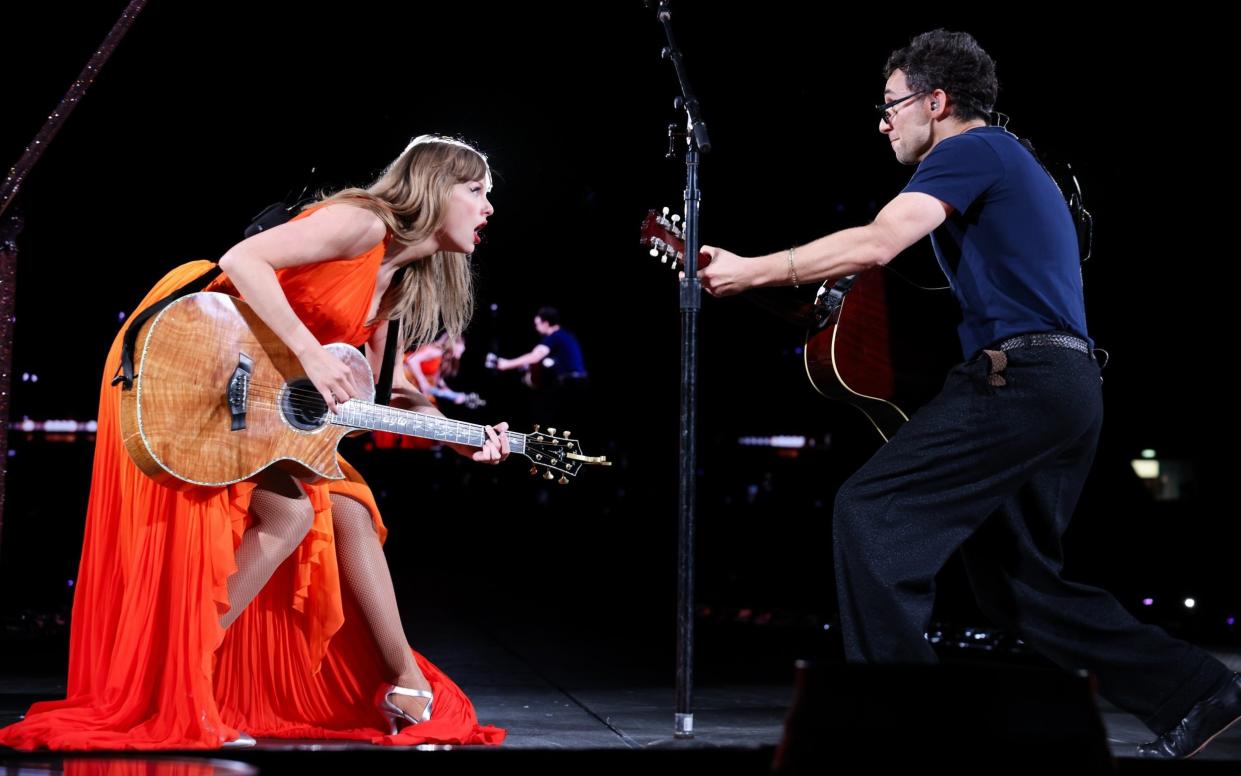 Taylor Swift on stage with Jack Antonoff during her final night at Wembley