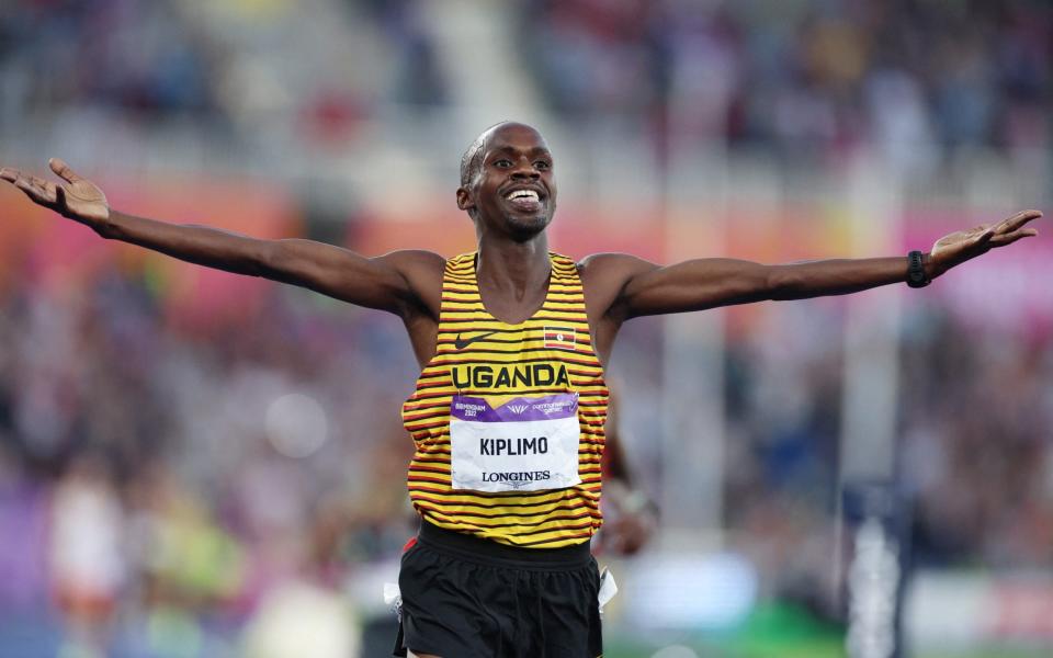 Jacob Kiplimo celebrates after winning gold in the men's 5000m final.  - REUTERS