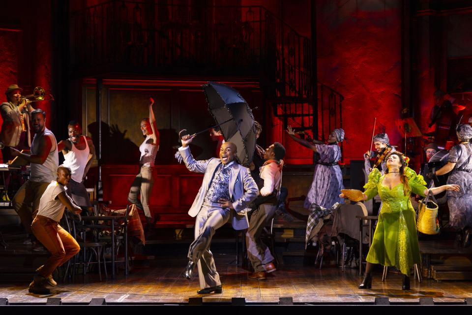 Nathan Lee Graham (center) in a scene from the national tour of the musical "Hadestown."