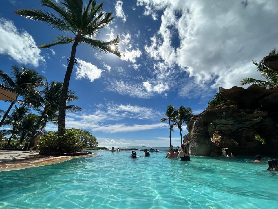 Aulani Resort Hawaii main pool with ocean in the back