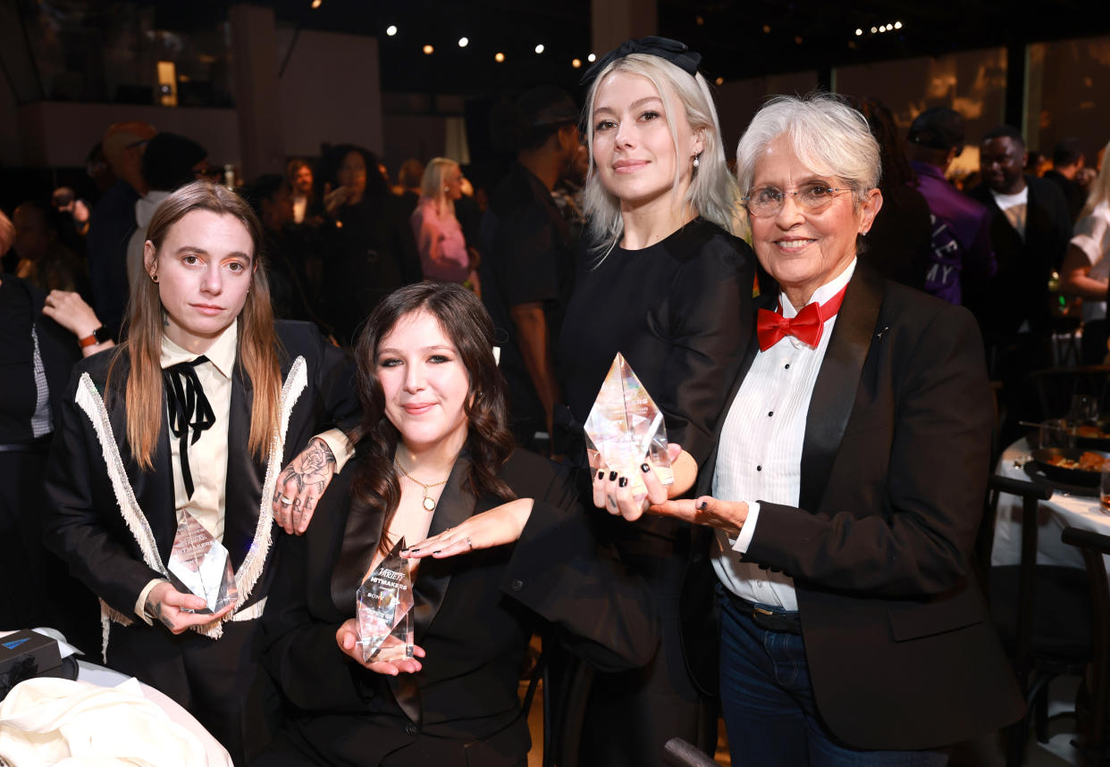 HOLLYWOOD, CALIFORNIA - DECEMBER 02: (L-R) Julien Baker, Lucy Dacus, Phoebe Bridgers of boygenius, winners of the Group of the Year award, and Joan Baez attend Variety's Hitmakers presented by Sony Audio on December 02, 2023 in Hollywood, California. (Photo by Matt Winkelmeyer/Variety via Getty Images)