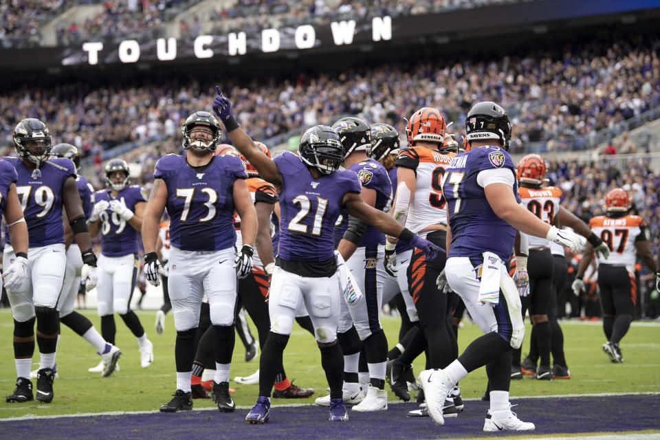 Baltimore Ravens running back Mark Ingram (21) reacts after scoring a touchdown on a run against the Cincinnati Bengals during the first half of a NFL football game Sunday, Oct. 13, 2019, in Baltimore. (AP Photo/Nick Wass)